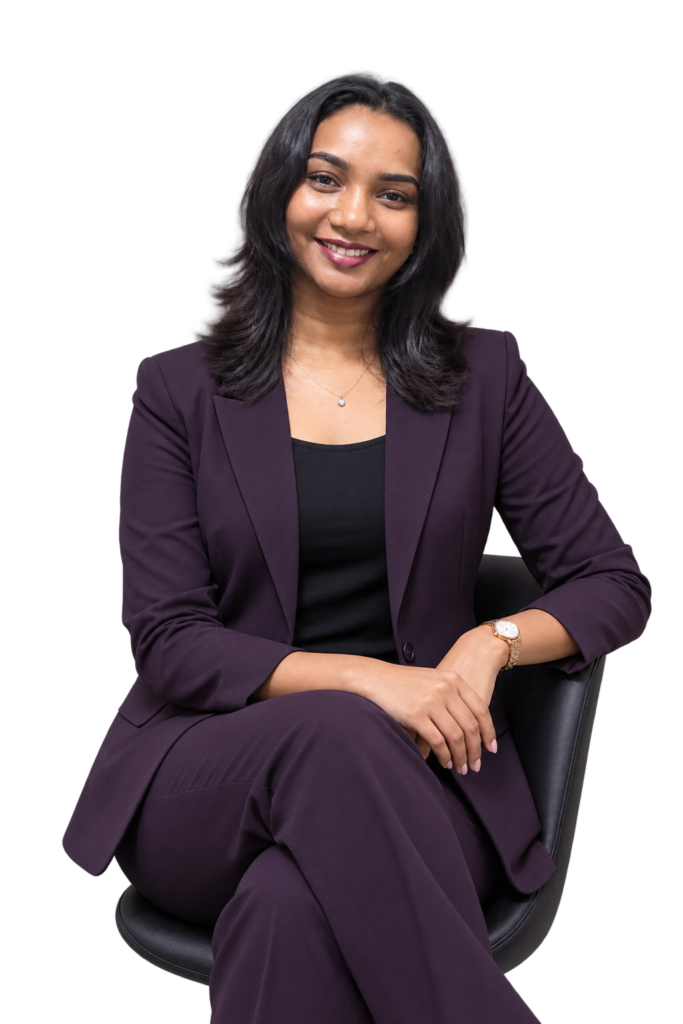 Best Freelance Digital Marketer in Ernakulam sitting in a chair wearing a professional purple business suit